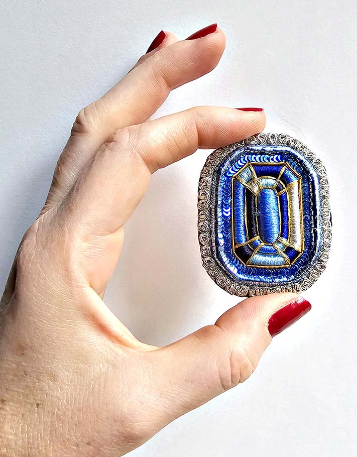 Sapphire trompe l'oeil brooch