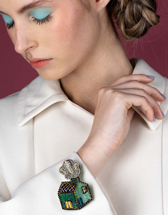 "Travel is my home" brooch