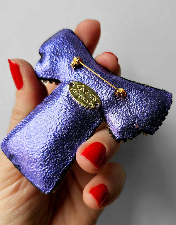 Spilla "Un grazioso fiocco giallo e viola"