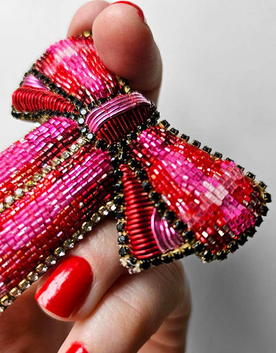 "A pretty Rose & Rouge bow" brooch