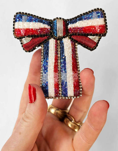 A pretty Blue & Red bow "brooch"