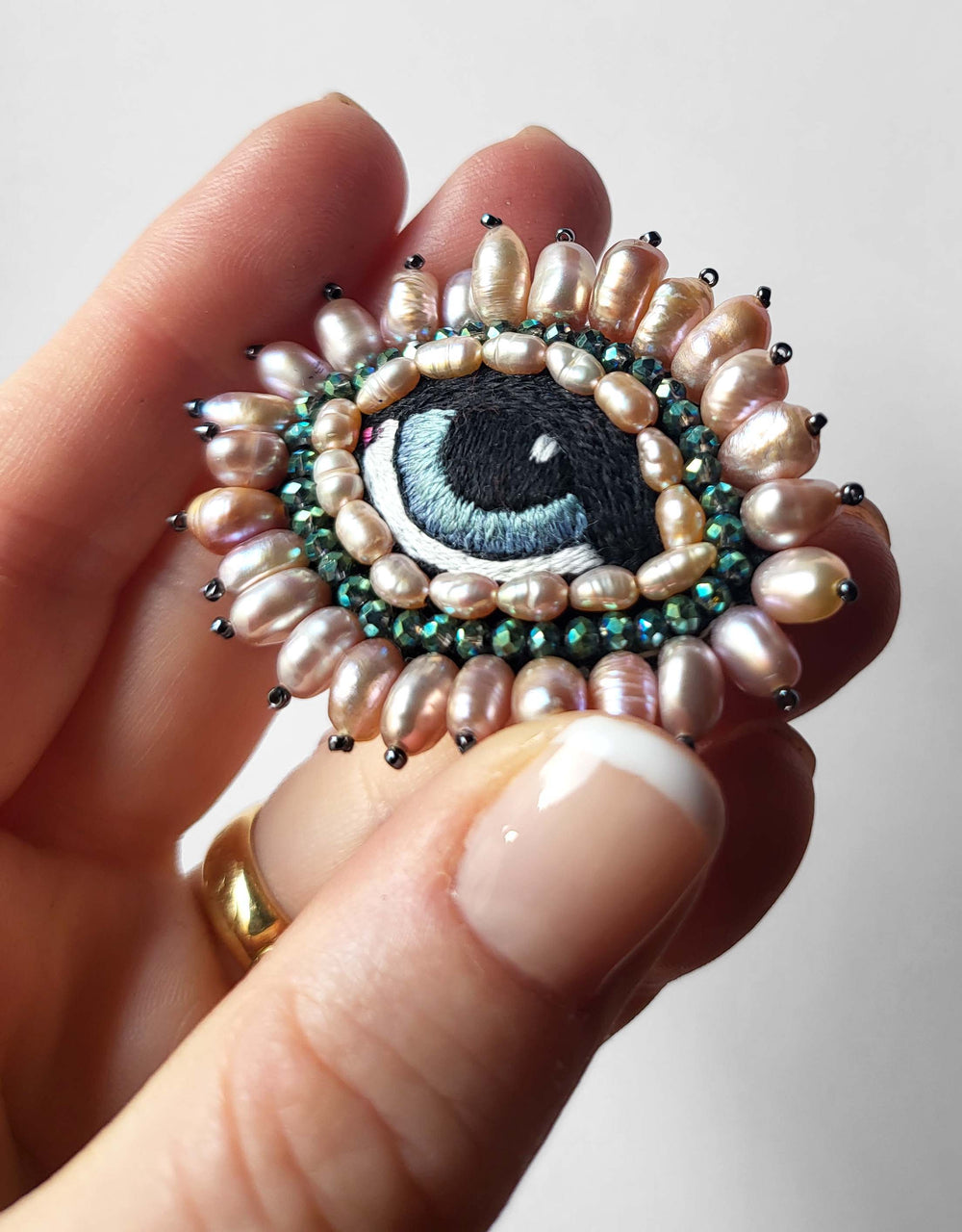 PINK AND GREEN BAROQUE EYE BROOCH
