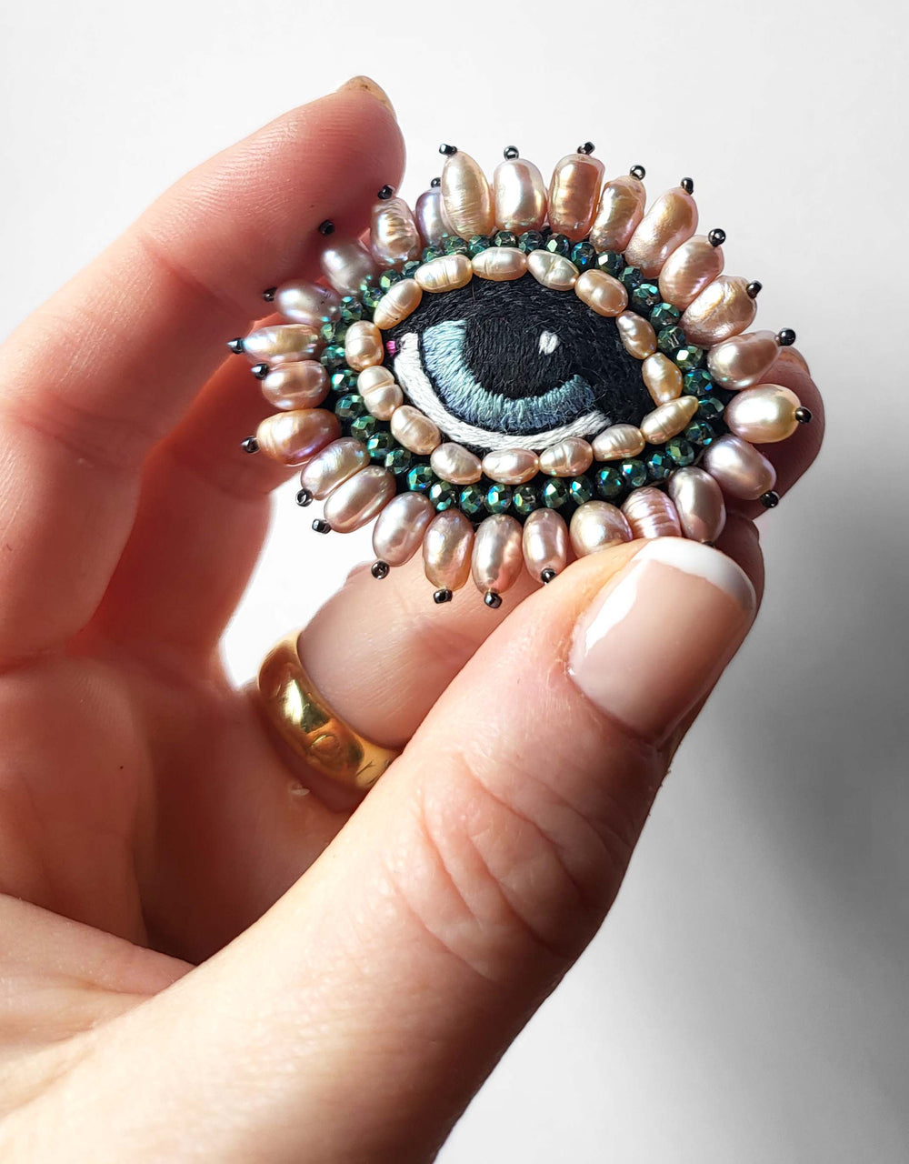 PINK AND GREEN BAROQUE EYE BROOCH