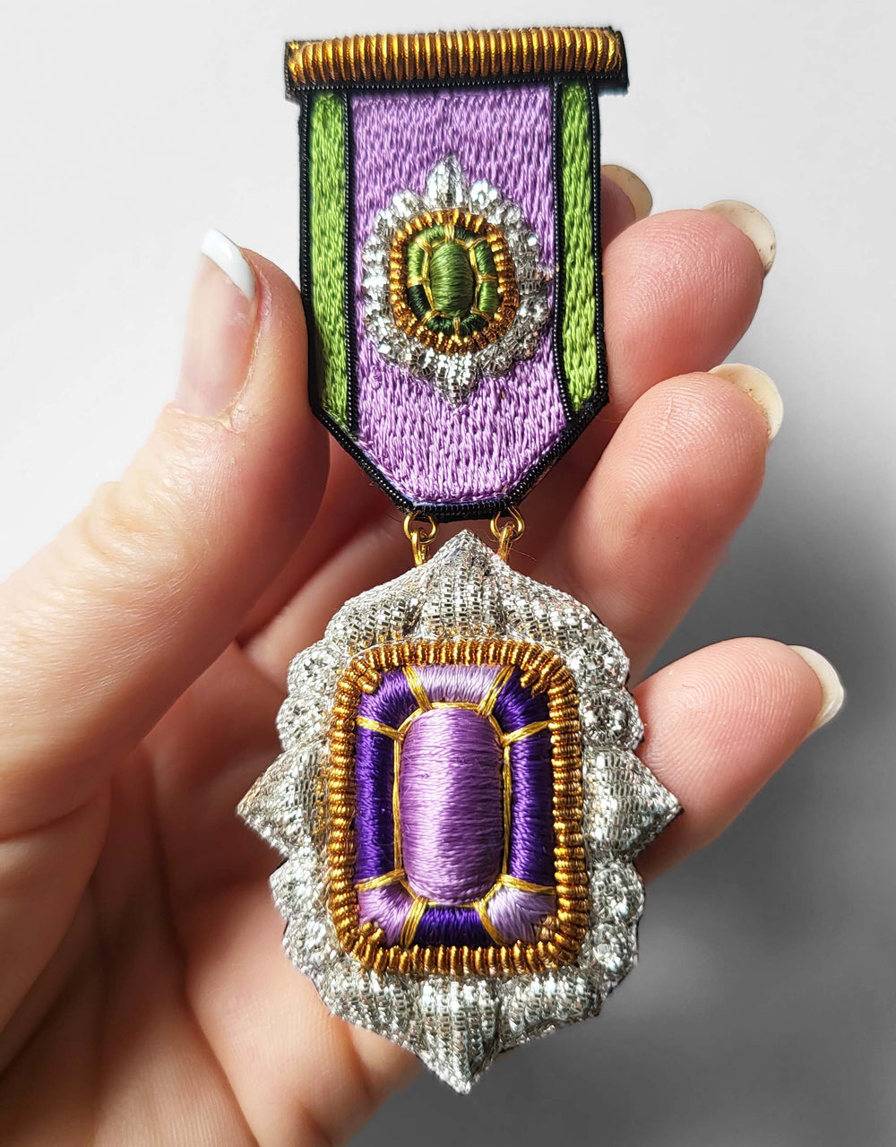 Youkounkoun Medal peridot and amethyst