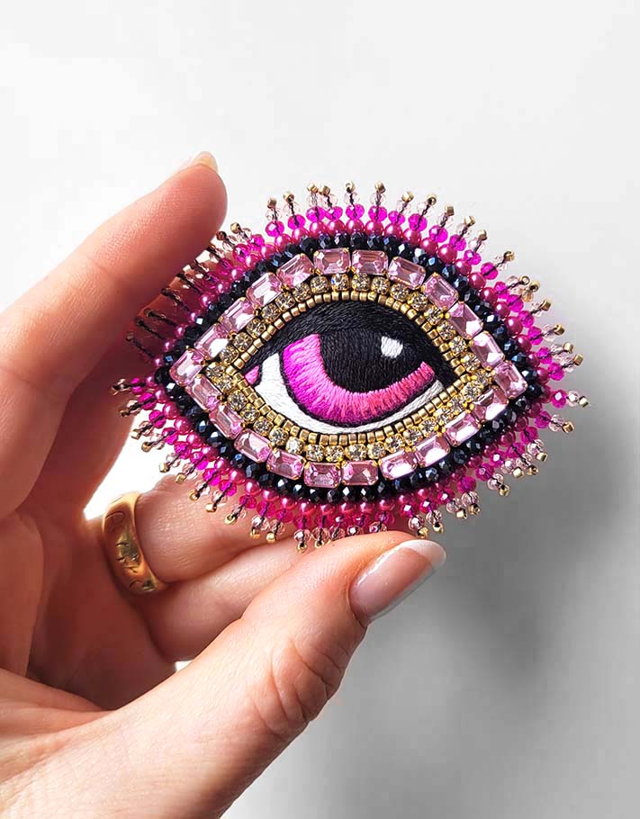 Heavenly Eye brooch in pink rhinestones